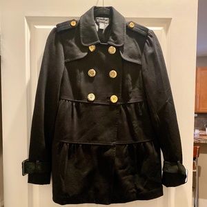 Black Jacket with gold button detail on front, shoulder, and sleeves.